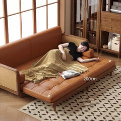 Wooden Sofa Bed with Cane Detailing & Leather Upholstery