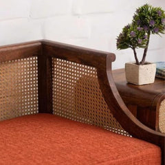 Two-seater rattan cane sofa with a teak-finished wooden frame