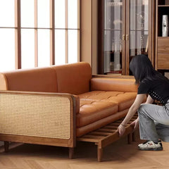 Wooden Sofa Bed with Cane Detailing & Leather Upholstery