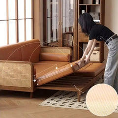 Wooden Sofa Bed with Cane Detailing & Leather Upholstery